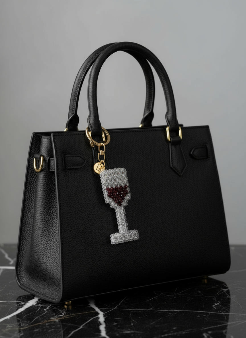 Beaded red wine in glass keychain.